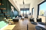 Budynek apartamentowo - usługowy