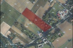 Działka inwestycyjna z zabudowaniami